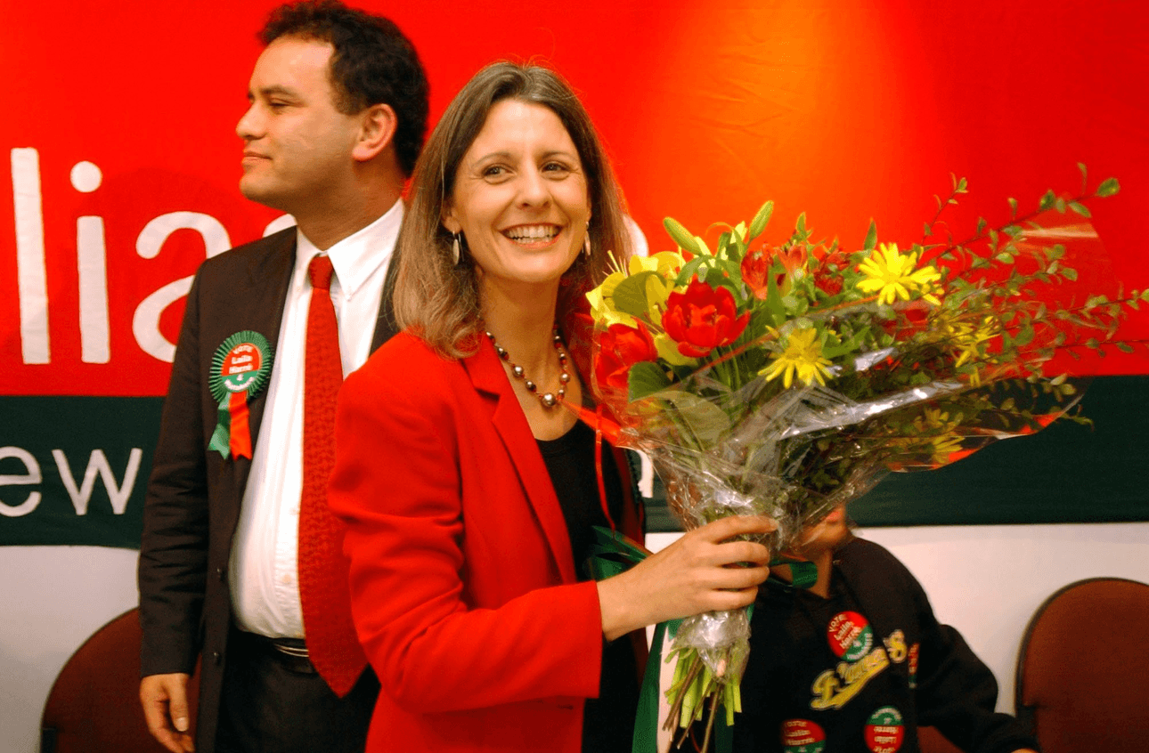 AUCKLAND, NEW ZEALAND - JUNE 29: Alliance Leader Laila Harr'e receives flowers with Matt McCarten in the background after talking to guests about her party's policy's at the Alliance Election campaign launch that was held at the Lincoln Green Hotel in Henderson, Saturday. (Photo by Dean Purcell/Getty Images)