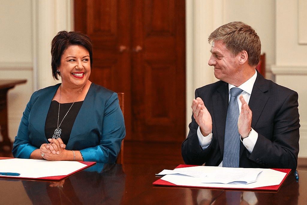 WELLINGTON, NEW ZEALAND - DECEMBER 12: Prime Minister Bill English applauds deputy Paula Bennett during a swearing-in ceremony at Government House on December 12, 2016 in Wellington, New Zealand. John Key announced his shock resignation on Monday, 5 December, saying it was time for him to focus on his family. He will officially hand in his resignation to the Governor-General later today. (Photo by Hagen Hopkins/Getty Images)