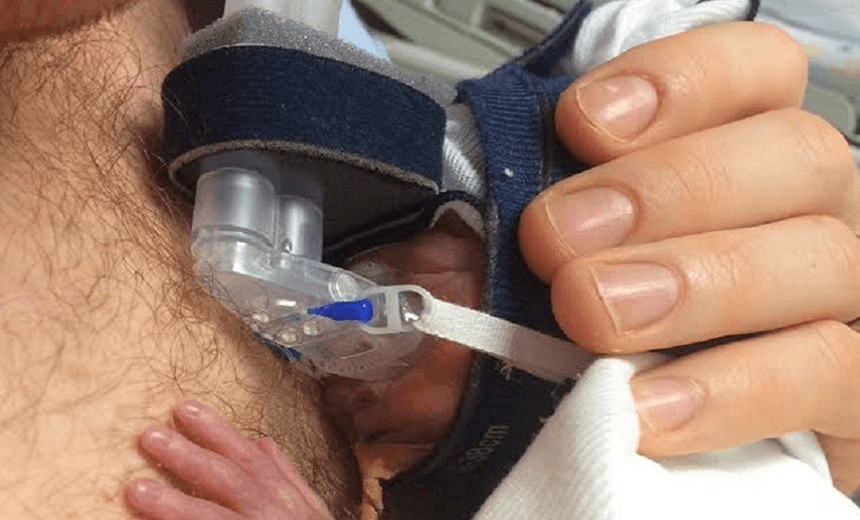 Baby Oliver on his dad's chest