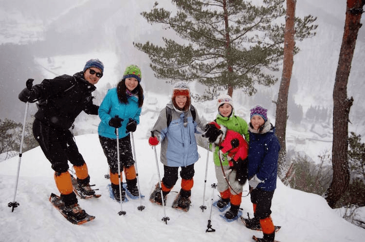 Michelle McCarthy (centre), skiing with friends in Japan. Photo: supplied