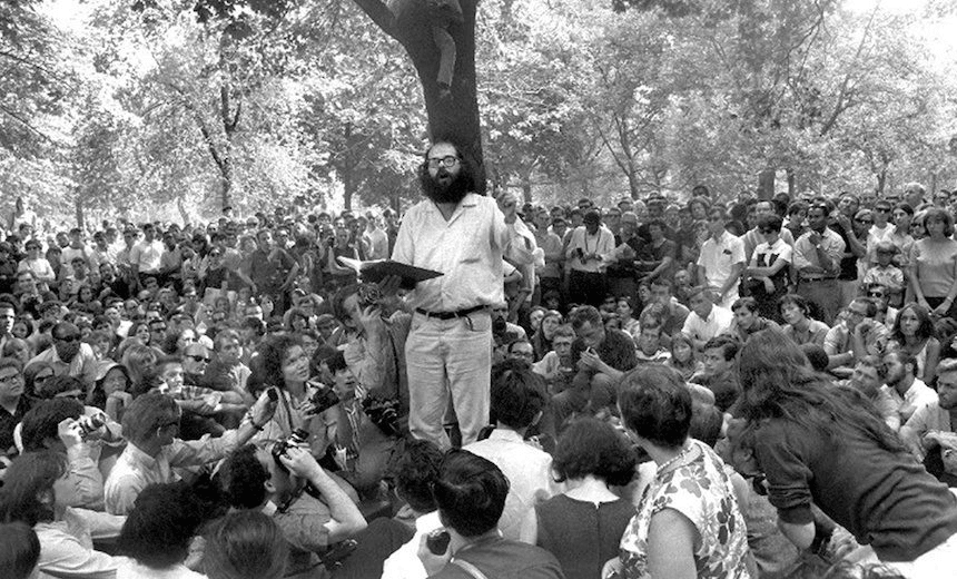 Allen Ginsberg reading his work to a crowd in Washington Square Park.  (Photo by Dan Farrell/NY Daily News Archive via Getty Images) 
