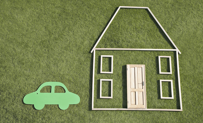 Outline of house and car in grass