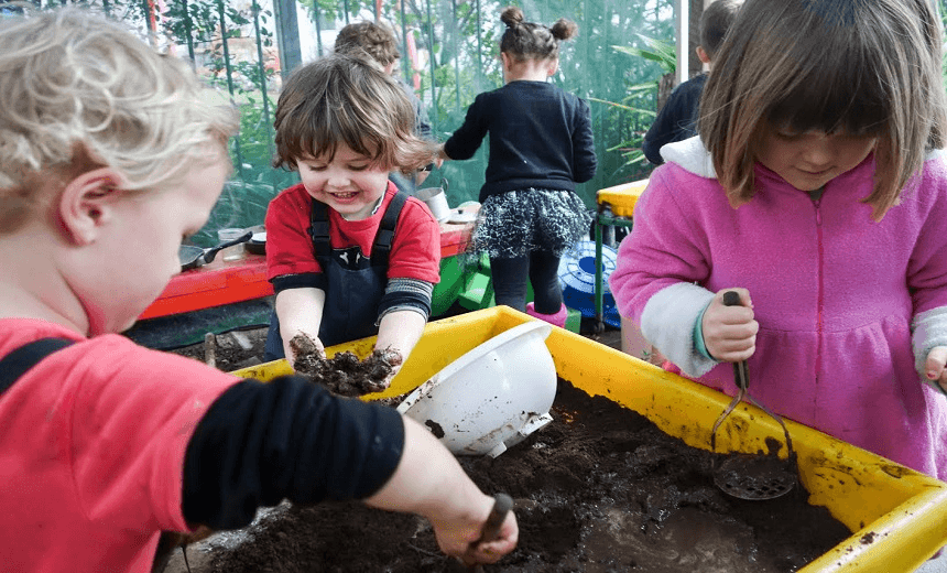 Sonya’s younger son Iggy playing with mud 
