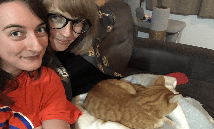 Author Amy, her wife Frith, and Daniel 
