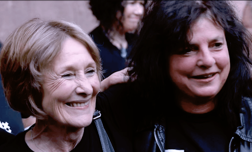 Aged caregiver Kristine Bartlett, left, who fronted the legal challenge, celebrates yesterday’s victory with an E tū union colleague