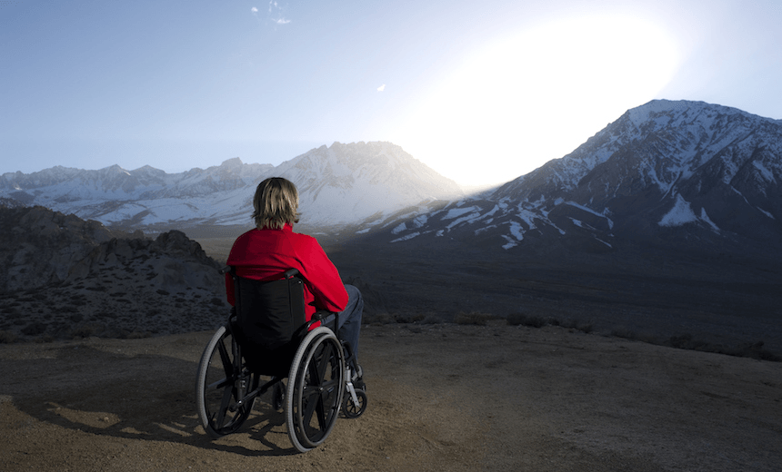 A man in a wheelchair 
