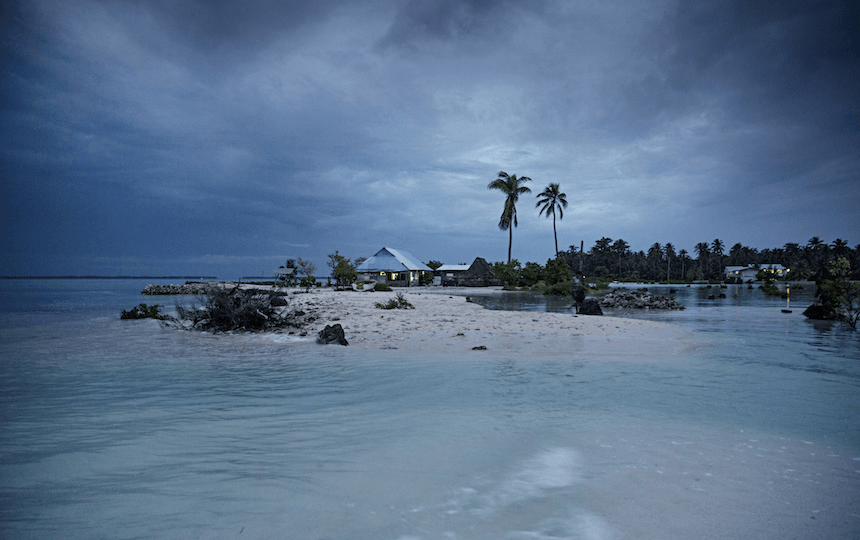 The small village Eita has become a separate island during high tide. The people of Kiribati are under pressure to relocate due to sea level rise. Each year, the sea level rises by about half an inch. 
(Photo by Jonas Gratzer/LightRocket via Getty Images) 
