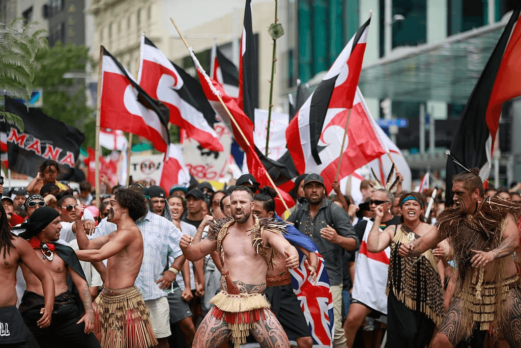A TPP protest hikoi makes its way down Queen Street, Auckland, on February 4, 2016. The signing ceremony marks the end of the TPP negotiation process to create one of the world’s biggest free-trade zones. (Photo by Phil Walter/Getty Images) 
