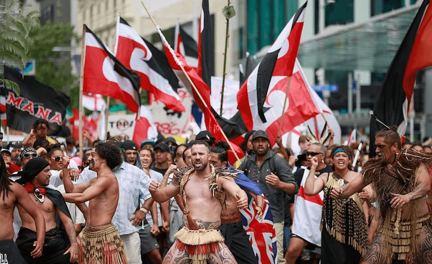 A TPP protest hikoi makes its way down Queen Street on February 4, 2016 in Auckland, New Zealand. The signing ceremony marks the end of the TPP negotiation process to create one of the world’s biggest free-trade zones. (Photo by Phil Walter/Getty Images)