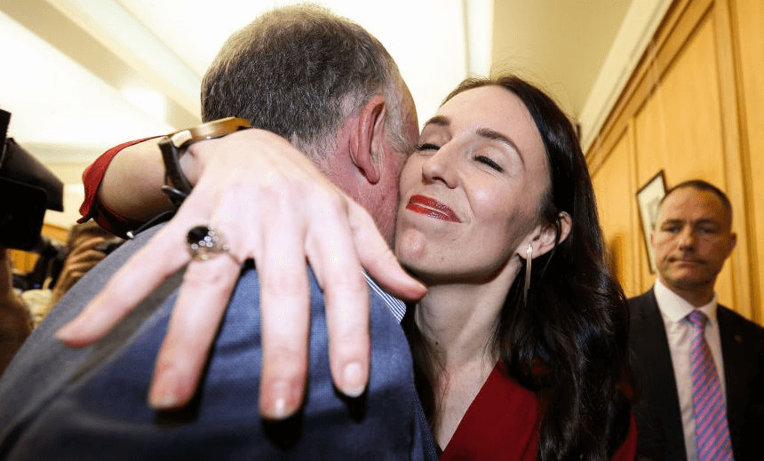 WELLINGTON, NEW ZEALAND – OCTOBER 19:  Prime Minister elect Jacinda Ardern hugs list MP Trevor Mallard during a Labour Party announcement at Parliament on October 19, 2017 in Wellington, New Zealand. After weeks of coalition negotiations, New Zealand First have announced their decision to form a coalition government with Labour and the Greens. With neither the National nor Labour parties winning enough seats in last month’s general election to govern outright, New Zealand First was left holding the balance of power.  (Photo by Hagen Hopkins/Getty Images) 
