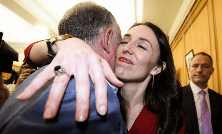 WELLINGTON, NEW ZEALAND – OCTOBER 19: Prime Minister elect Jacinda Ardern hugs list MP Trevor Mallard during a Labour Party announcement at Parliament on October 19, 2017 in Wellington, New Zealand. After weeks of coalition negotiations, New Zealand First have announced their decision to form a coalition government with Labour and the Greens. With neither the National nor Labour parties winning enough seats in last month’s general election to govern outright, New Zealand First was left holding the balance of power. (Photo by Hagen Hopkins/Getty Images)