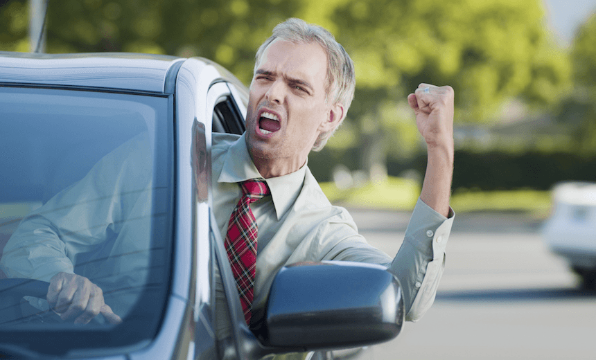 Angry driver shouting out car window, presumably at high petrol prices (File photo)  
