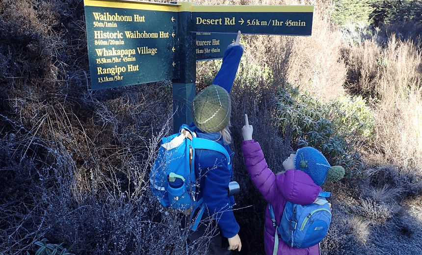 The author’s children at the Waihohonu Hut sign. 
