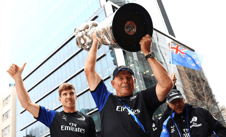 (L-R) Peter Burling and Grant Dalton celebrate with the Americas Cup during the Team New Zealand Americas Cup Welcome Home Parade on July 6, 2017 in Auckland. (Photo: Hannah Peters/Getty Images) 
