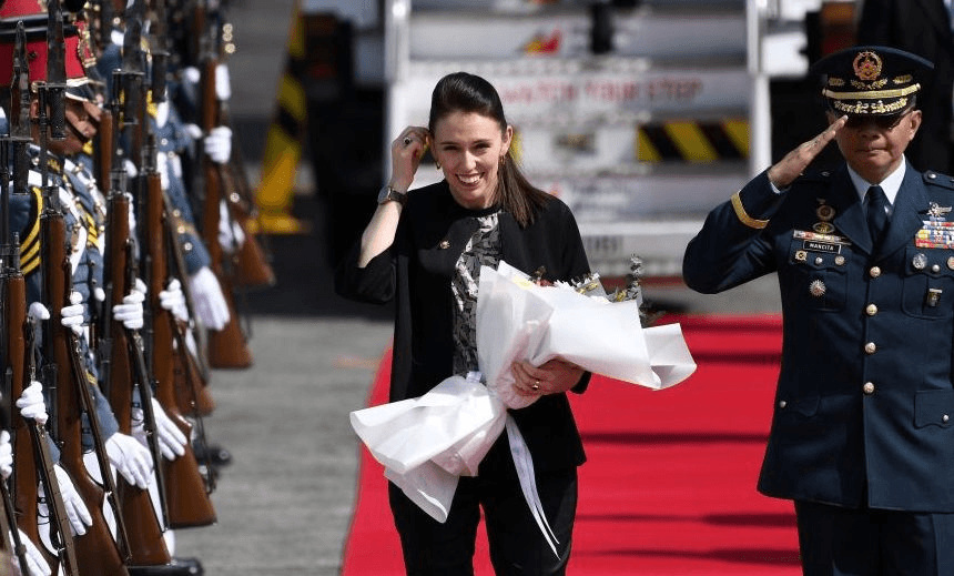 New Zealand’s Prime Minister Jacinda Ardern (C) walks next to Philippine Air Force Major General Arnold Mancita upon arriving at Clark International airport in Pampanga province, north of Manila on November 12, 2017 to attend the 31st Association of South East Asian Nations (ASEAN) Summit.
World leaders arrive in the Philippines’ capital for two days of summits beginning on November 13. / AFP PHOTO / MANAN VATSYAYANA (Photo credit should read MANAN VATSYAYANA/AFP/Getty Images)