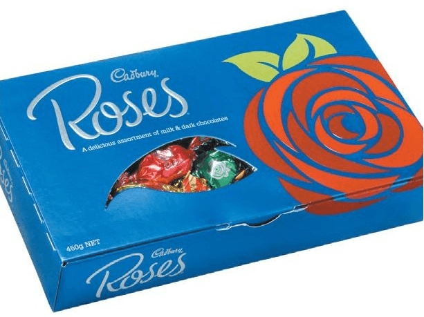 a blue cadbury roses box in the old style