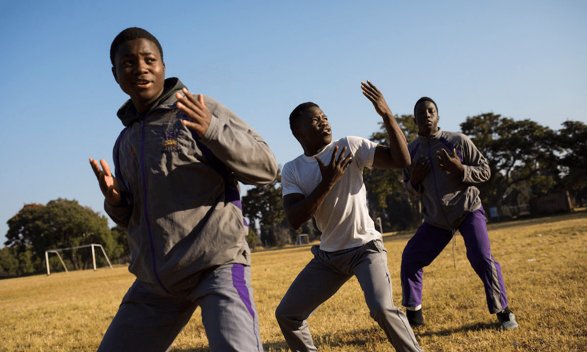 Nigel Tinarwo (left), Cosmas Mubaiwa (centre) and Blithe Mavesere (right) practice their haka the morning after their scheduled game against Vainona High School. Vainona forfeited the game, as they didn’t show up to play, something that is prevalent in Zimbabwean schoolboy rugby. Some of the weaker performers in rugby will not show up to be beaten heavily by the stronger schools like Churchill. The Churchill team did not get to perform their haka as they only do after they win their games. Their haka is based on the world champion New Zealand All Blacks rugby team haka called ‘Ka Mate’, a Maori (indigenous people of New Zealand) war dance, with similar actions and words, which has morphed and changed since it was first performed in 1995. Picture: CORNELL TUKIRI © 09 July 2017 
