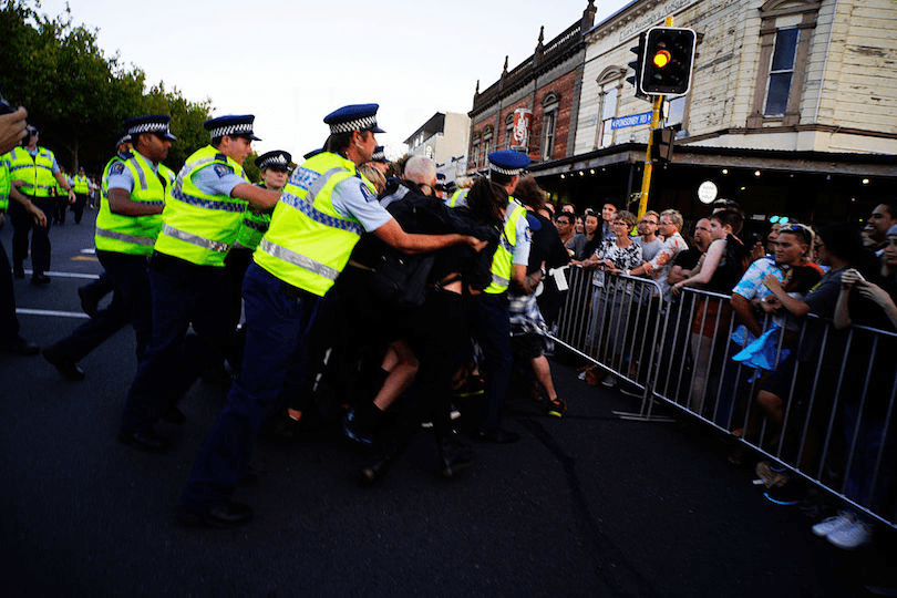 Protesters clash with police at the Auckland Pride Party on February 20, 2016 in Auckland. 
 (Photo by Cam McLaren/Getty Images) 
