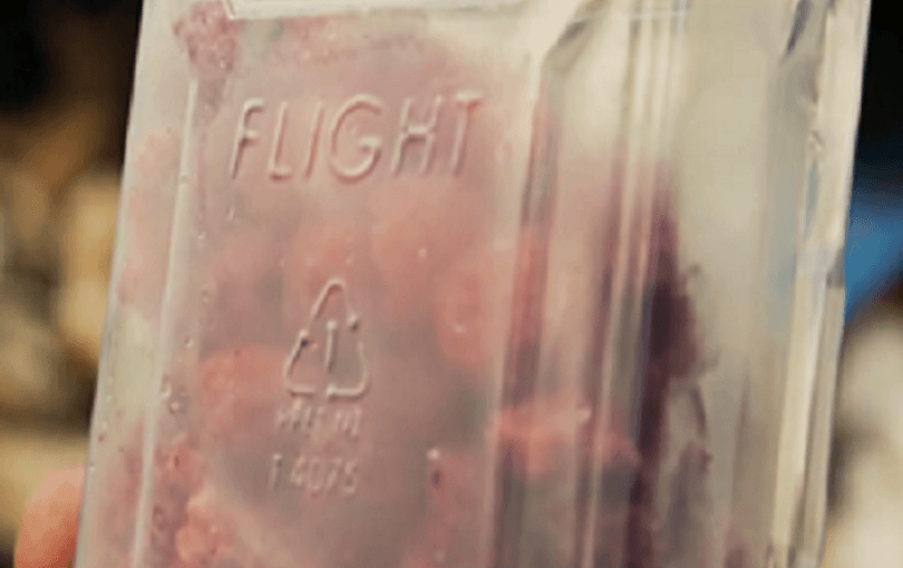 a plastic recycling code 1 on a piece of clear plastic