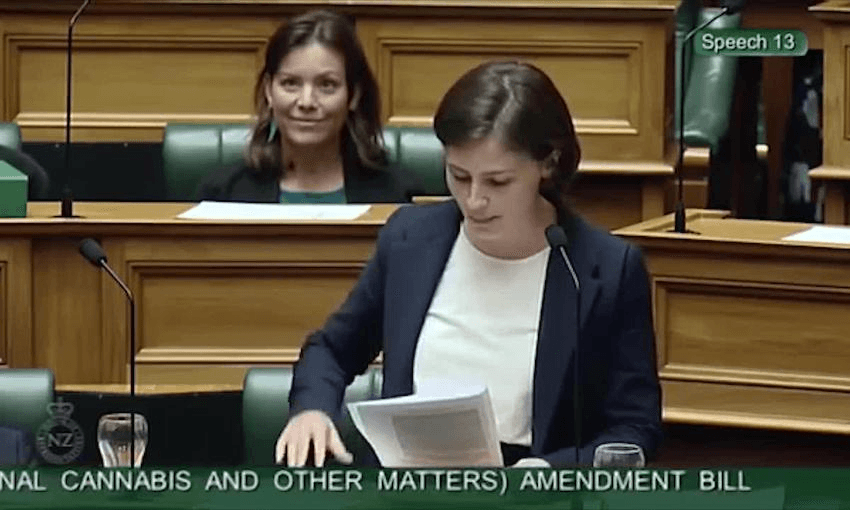 Green MP Chlöe Swarbrick speaks in Parliament in support of the medicinal cannabis bill. Fellow Green MP Julie Anne Genter, who introduced the bill, is sitting behind. 
