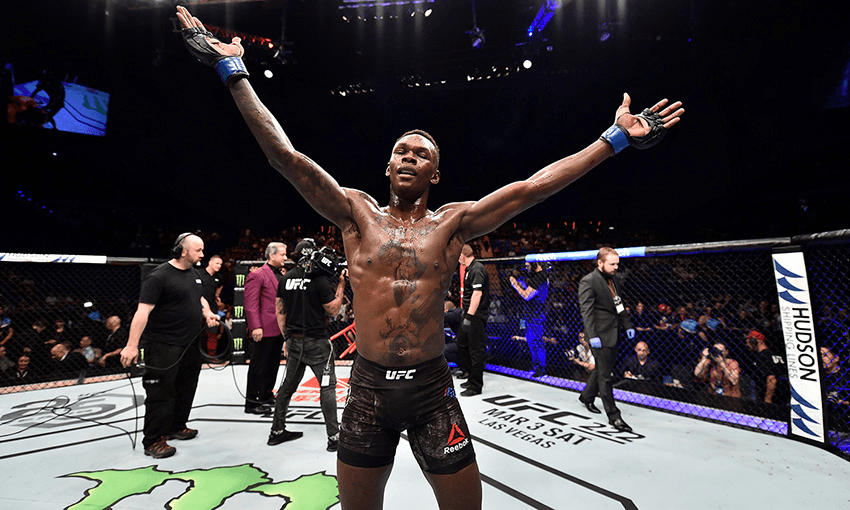 Israel Adesanya celebrates his victory over Rob Wilkinson. (Photo by Jeff Bottari/Zuffa LLC/Zuffa LLC via Getty Images)