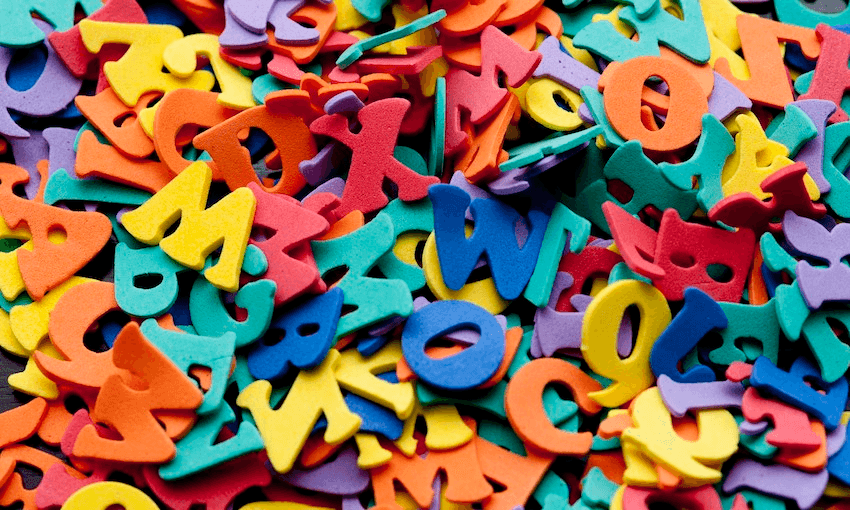 Random pile of colourful plastic letters