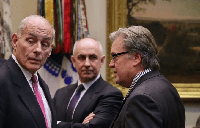 Chris Liddell casts a glance at former Trump aide Steve Bannon (Getty Images)  
