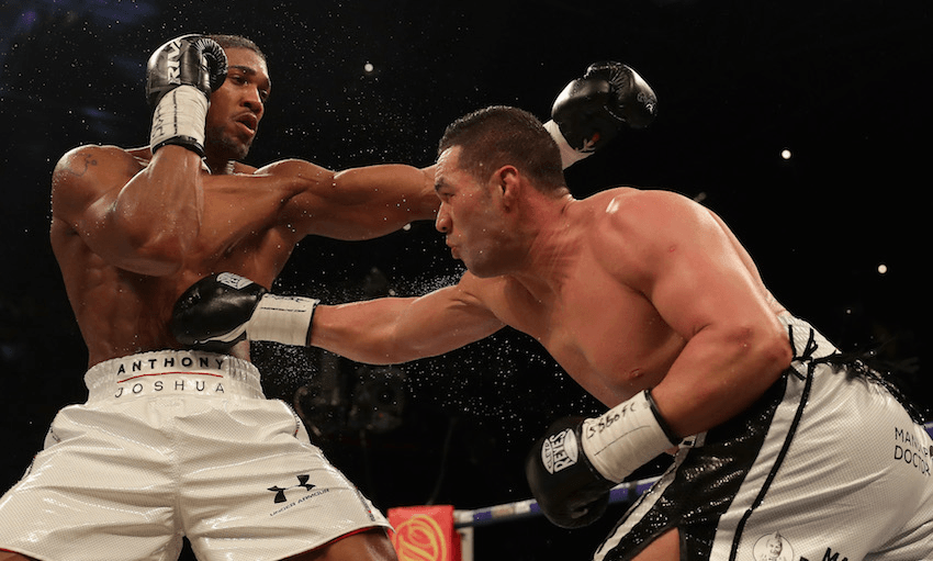 CARDIFF, WALES – MARCH 31:  Anthony Joshua and Joseph Parker exchange punches during their WBA, IBF, WBO & IBO Heavyweight Championship title fight at Principality Stadium on March 31, 2018 in Cardiff, Wales. (Photo by Richard Heathcote/Getty Images) 
