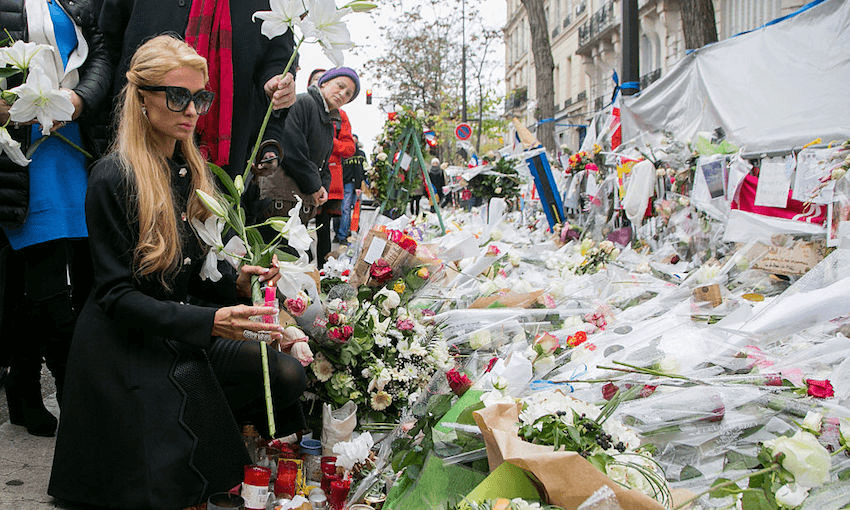 Paris Hilton gives a tribute to the victims of the terrorist attack at the Bataclan concert hall  on December 11, 2015 in Paris, France.  (Photo by Marc Piasecki/Getty Images) 
