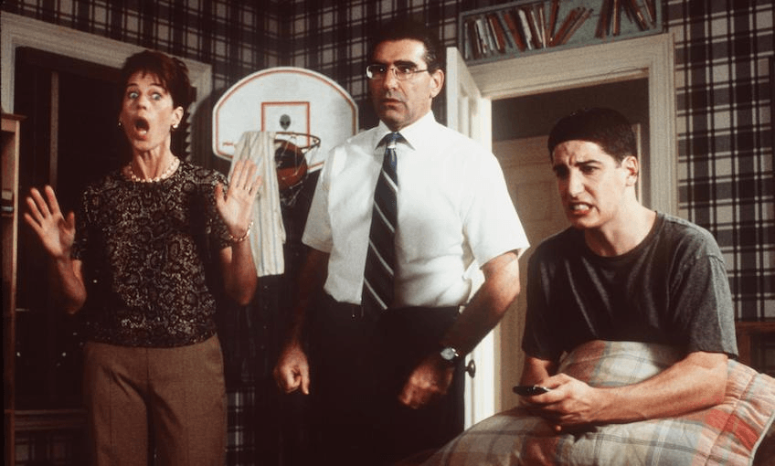 Jim (Jason Biggs) Is Caught In An Embarrassing Moment By His Mom (Molly Cheek) And Dad (Eugene Levy) In “American Pie.”  (Photo By Getty Images) 
