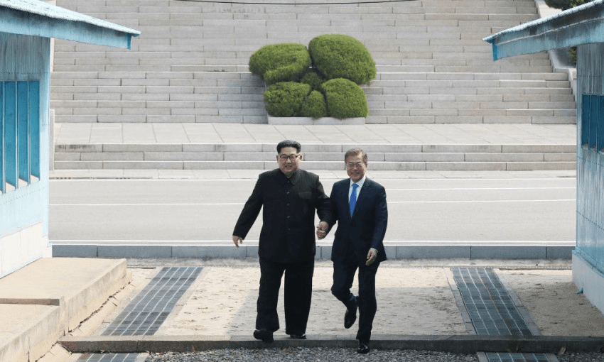 Korean leaders Kim Jong-Un and Moon Jae-in met each other at the DMZ, the heavily fortified border between the two Koreas. (Getty Images)  
