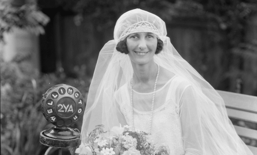 Aunt Gwen of Radio 2YA at her wedding reception held in her parents’ garden. This was New Zealand’s first ‘celebrity wedding’ to be broadcast live. Miss Gwen Shephard on the occasion of her marriage to Mr B.H. Stennett, Alexander Turnbull Library, Wellington, Ref: 1/1-032983-F 
