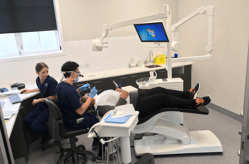 Faiamio Faosiliva recieving treatment on the opening day of Te Kaika’s dental clinic (Photo: supplied). 
