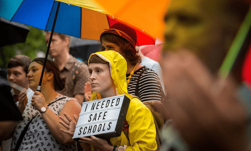Protesters attend the Hands Off Safe Schools Rally on Swanston Street on March 10, 2016 in Melbourne, Australia. The Hands Off Safe School has been designed as a resource for teachers and students to assist with issues of homophobia and bullying.  (Photo by Chris Hopkins/Getty Images) 
