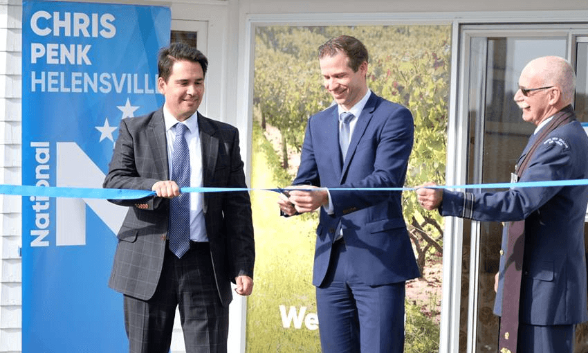 Simon Bridges and Chris Penk cutting the ribbon on Penk’s new electorate office in the former electorate of Helensville (image via Facebook)  
