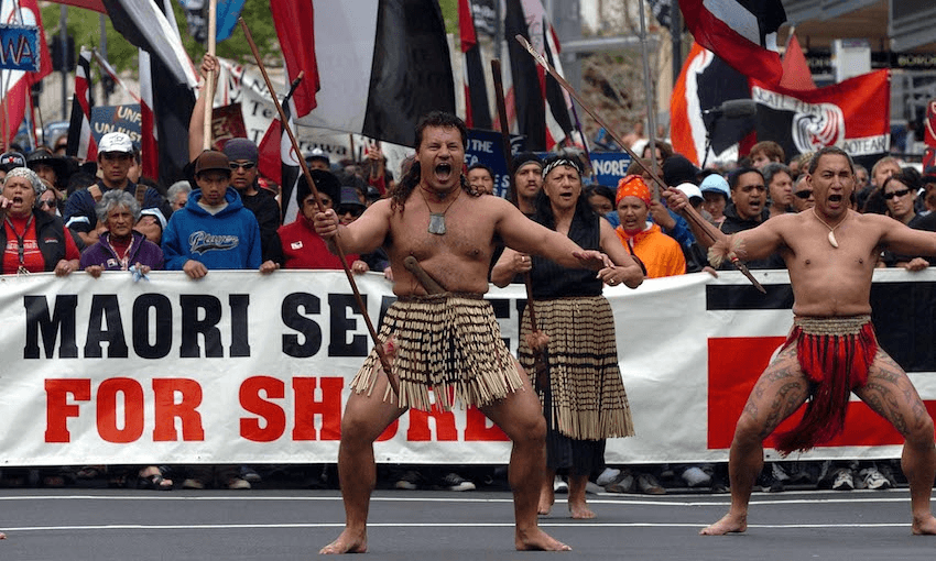 The Hikoi protest march against the Foreshore and Seabed Bill makes its way down Queen St in Auckland, New Zealand, October, 2004. (Photos: FOTOPRESS/Phil Walter). 
