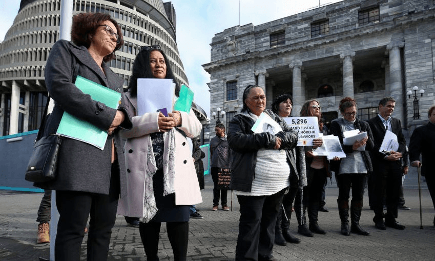 Christine Ammunson with then Race Relations Commissioner Dame Susan Devoy presenting a petition at Parliament on July 6, 2017. Photo by Hagen Hopkins/Getty Images 
