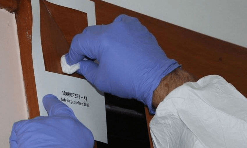 Testing a house for meth contamination. Photo: Katy Gosset/RNZ 
