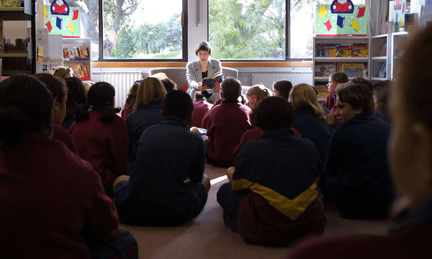 Helen Clark reads (Photo by Michael Bradley/Getty Images) 
