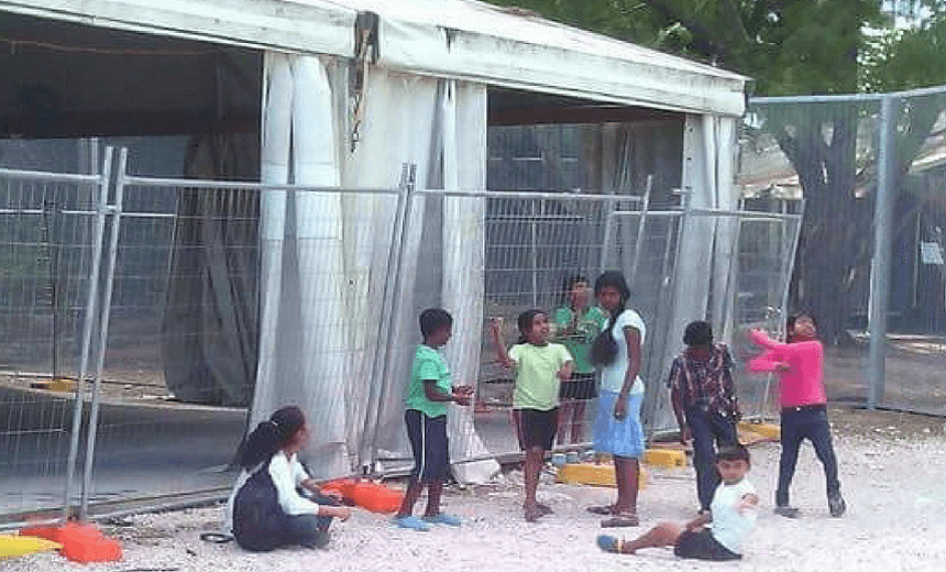 Refugee children playing in Nauru in January 2018. Photograph made public by We Care Nauru, with permission. 
