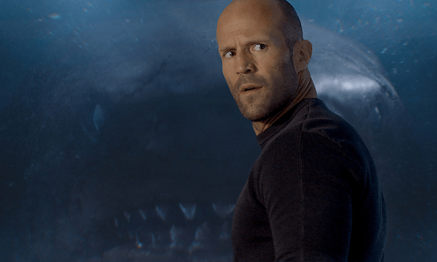 Giant sharks are no smiling matter for Jason Statham (PHOTO: Warner Bros. Pictures)