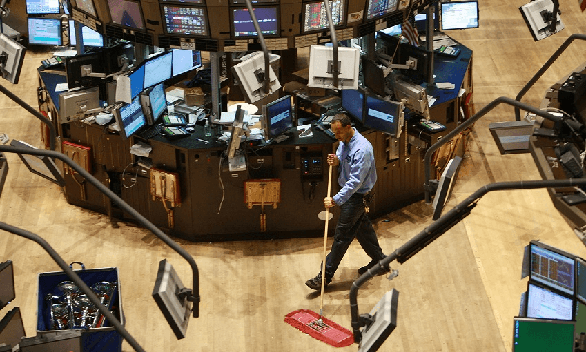 A custodian cleans up the floor of the New York Stock Exchange September 15, 2008 in New York City.(Photo: Spencer Platt/Getty Images) 
