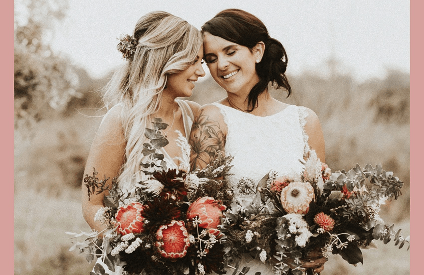 Sara and Melanie’s wedding features on Together Journal’s October cover. (Photo: Charlotte Sowman) 
