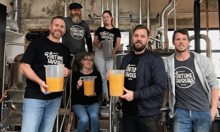 From left: Richard Poole (Fine Wine Delivery Co), Dale Cooper (Fortune Favours), Alice Neville (The Spinoff), Georgia Davies, Adrian Heyes (both FWD Co) and Marcus Ebert (Fortune Favours) prepare to add a key ingredient: grapefruit juice