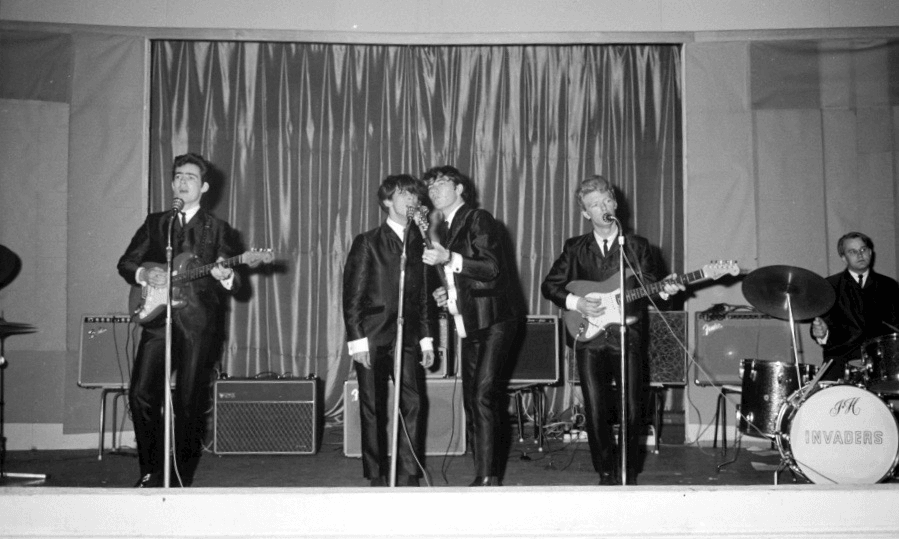 Ray Columbus and the Invaders play in 1964 at Phil Warren’s Oriental Ballroom on upper Symonds Street. (Auckland Libraries, Rykenberg Collection, 1269-W240-15) 
