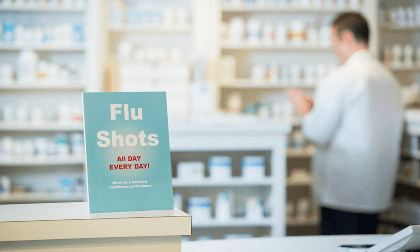Flu shots sign in pharmacy