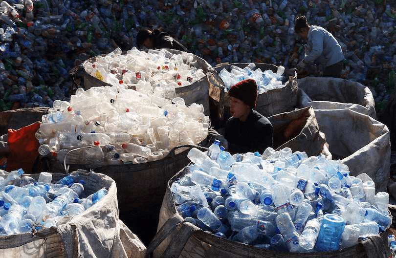 Sacks of empty plastic bottles at a Beijing recycling centre