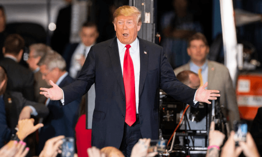 Donald Trump arrives at a campaign rally at the Pensacola International Airport, Florida, on November 3. Photo by Mark Wallheiser/Getty Images