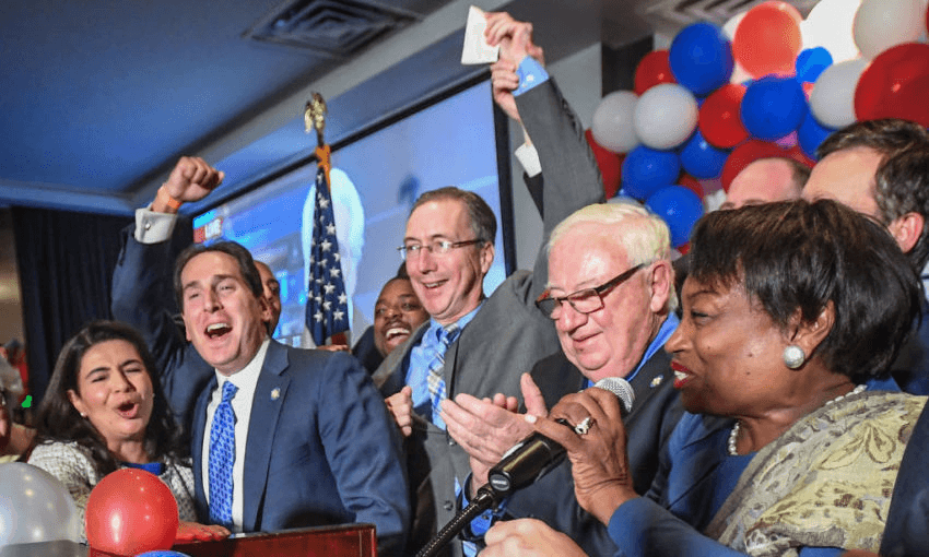 Members of the new New York State Senate Democratic majority celebrate their victory at Democratic election night victory party on November 6. (Photo by Thomas A. Ferrara/Newsday via Getty Images) 
