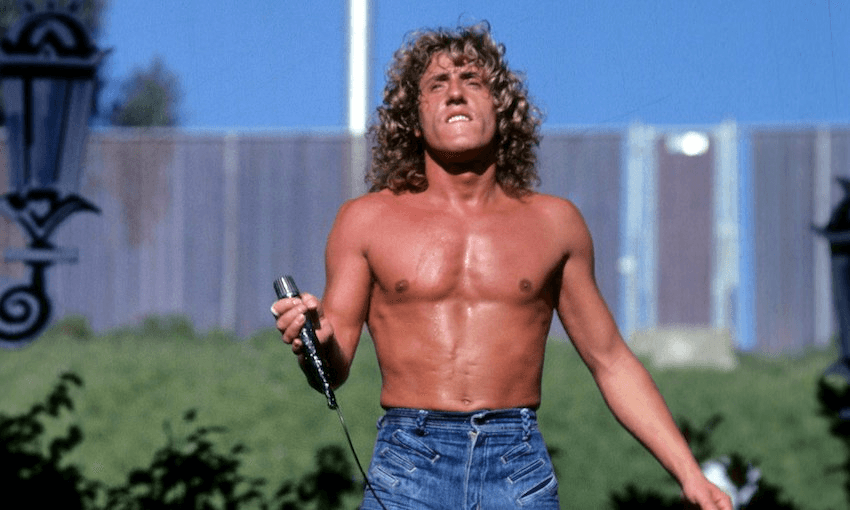 Roger Daltrey of the Who performs at the Oakland Coliseum in Oakland, California on October 9, 1976. (Photo by Larry Hulst/Michael Ochs Archives/Getty Images) 
